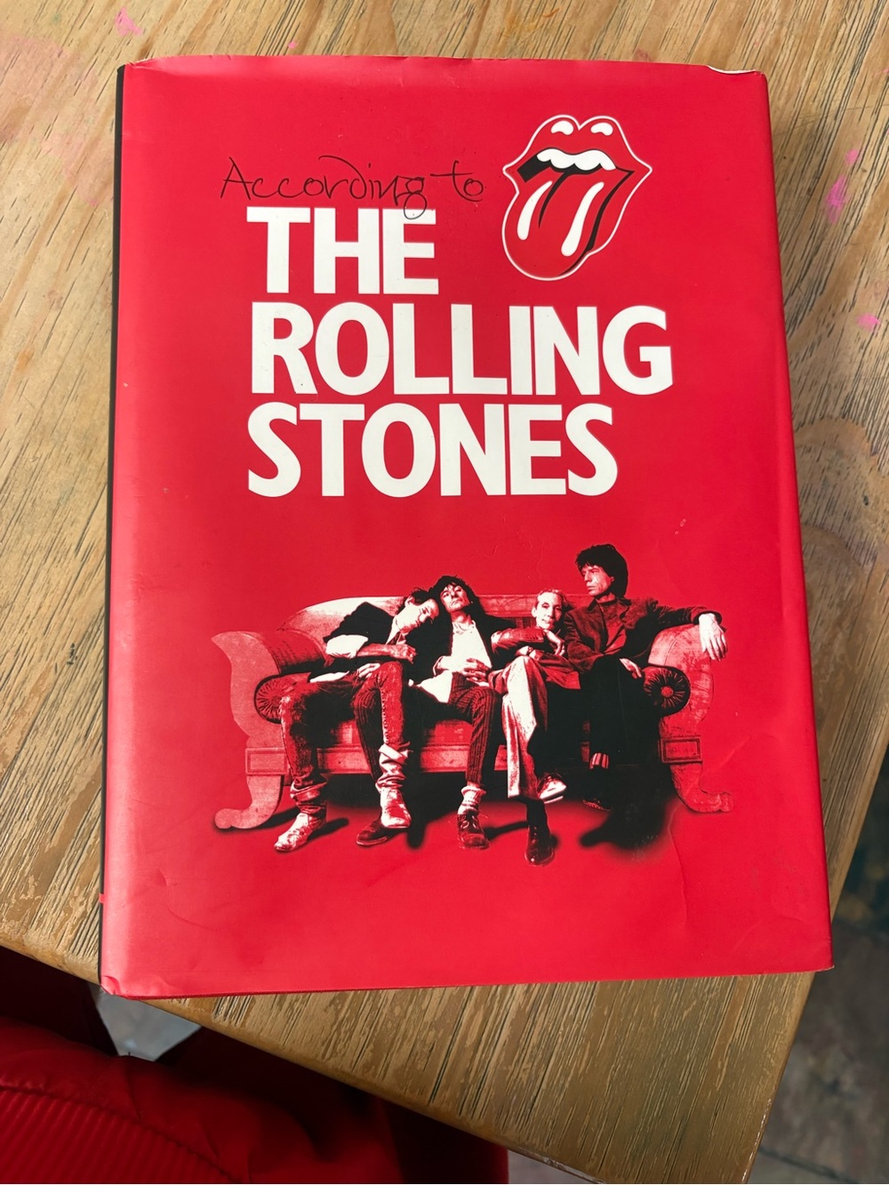 the Rolling Stones Red Hardcover Coffee Table Book with Iconic Tongue Logo